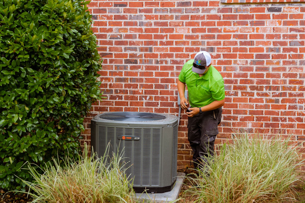 AirSouth Technicians with Air Conditioner